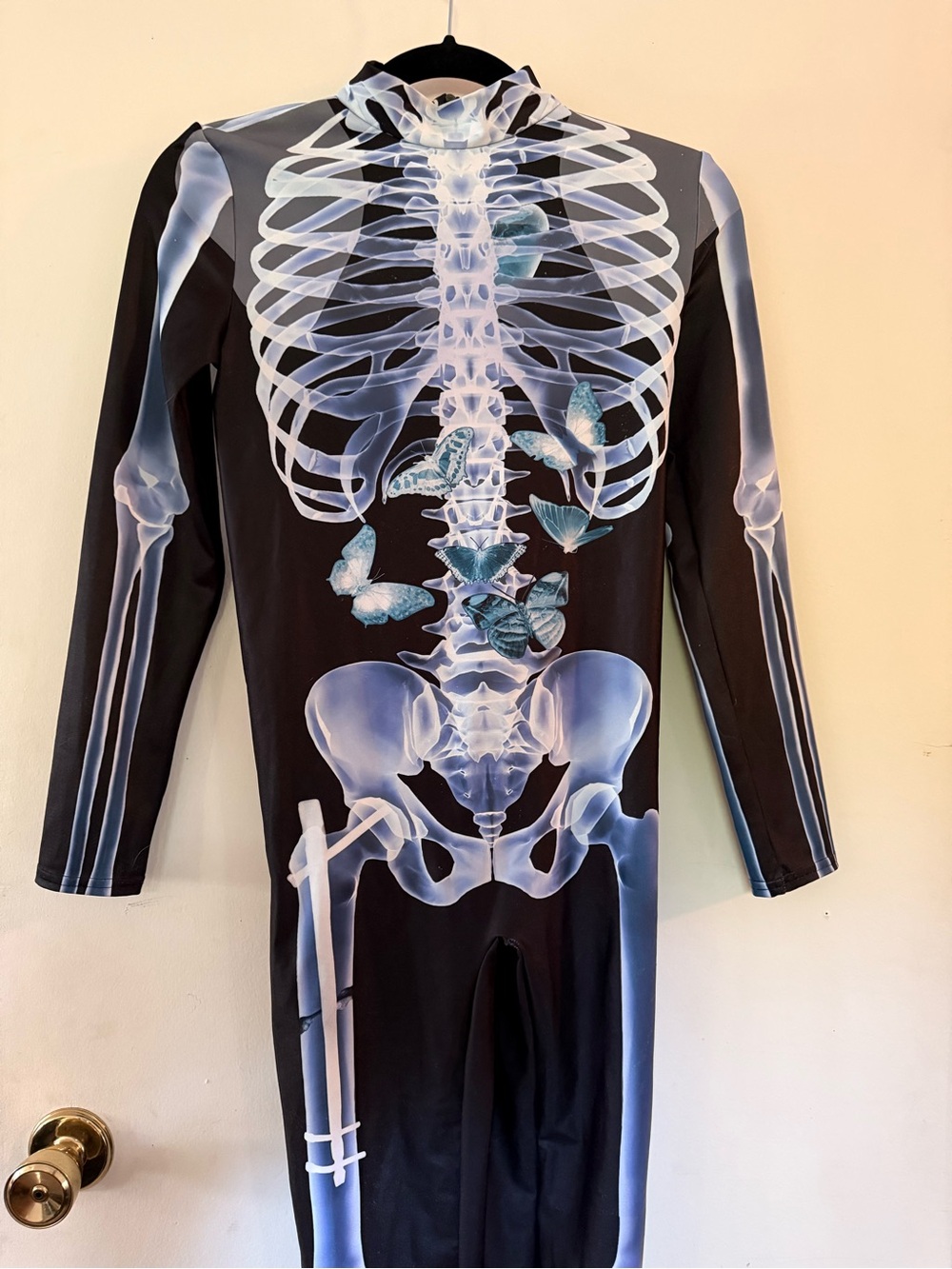 Black Skeleton X-Ray Jumpsuit with Blue Butterfly Graphic
